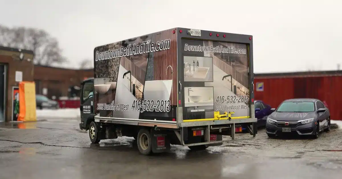 Downtown Bath & Tiles - Isuzu - NPR Box Truck Full Wrap - After - Back Side Angle