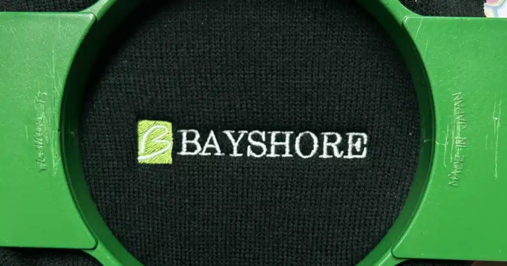 Bayshore Hat in the embroidery process. Apparel branding for Bayshore was important for brand visibility.