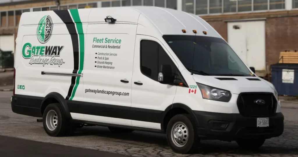 A side view of a Ford Transit, displayed with a partial wrap