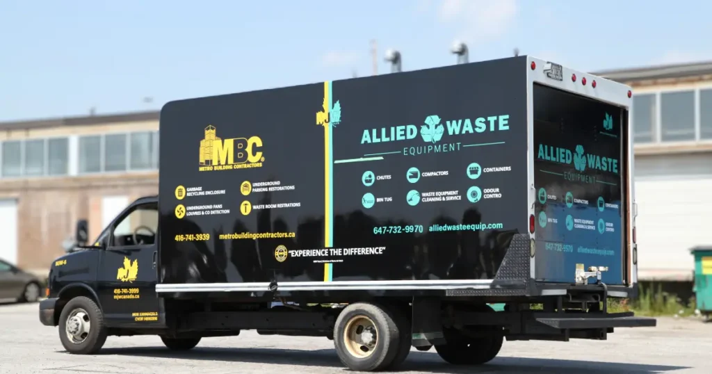 Side view of chevy box truck displaying full wrap decal.