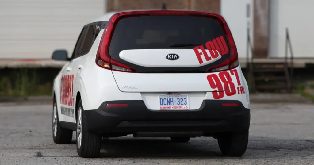 Flow 98.7 decals displayed on a KIA Soul