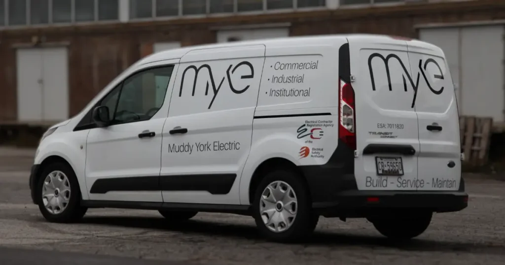 Muddy York Electric truck decals showcased on a Ford Transit Connect