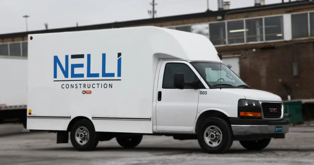 Nelli Construction – Sleek & Modern Lettering & Decals for GMC Savana G3500